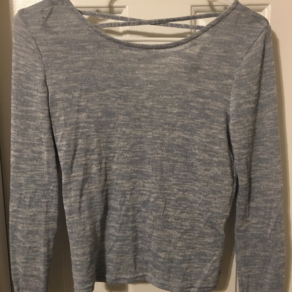 Long sleeve open back sweater.